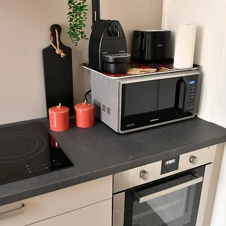 At In - Center Апартаменты